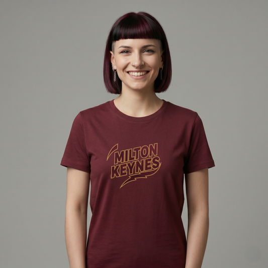 Graphic t-shirt featuring retro sports-style Milton Keynes text logo on a black background.